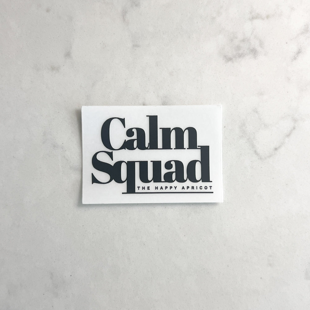 White card with 'Calm Squad' text on a marble surface