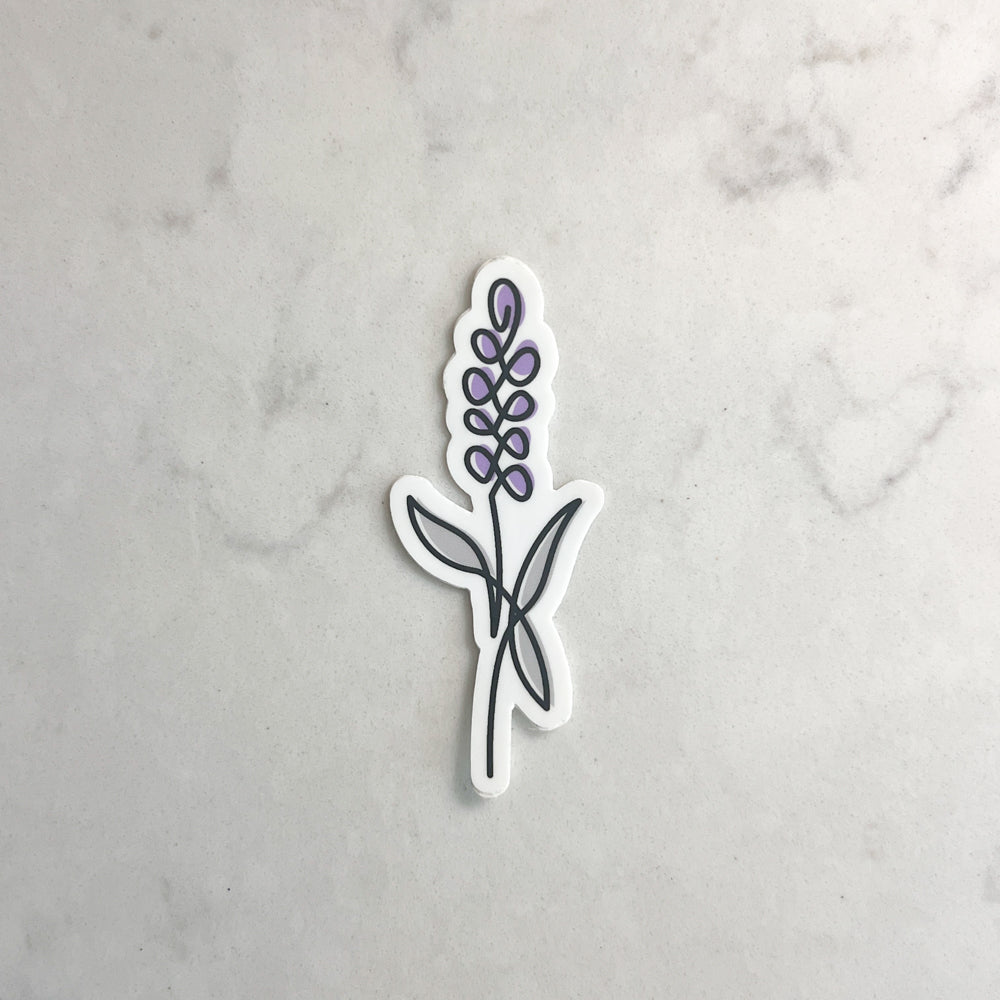 Sticker of a lavender plant on a marble surface